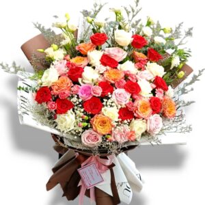 Bouquet of multi-colored roses in warm tones