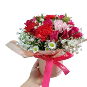 Small flower box of carnations and roses