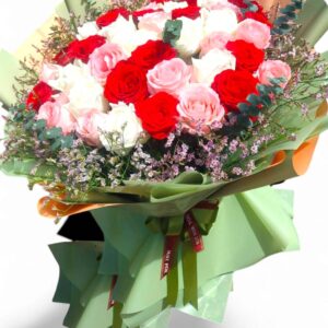 Large bouquet of white, red, and pink roses
