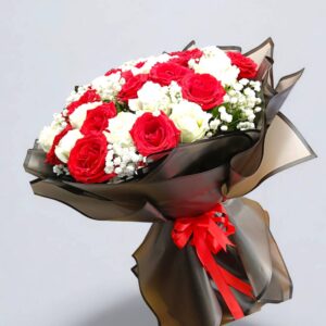 31 red and white roses decorated with black paper