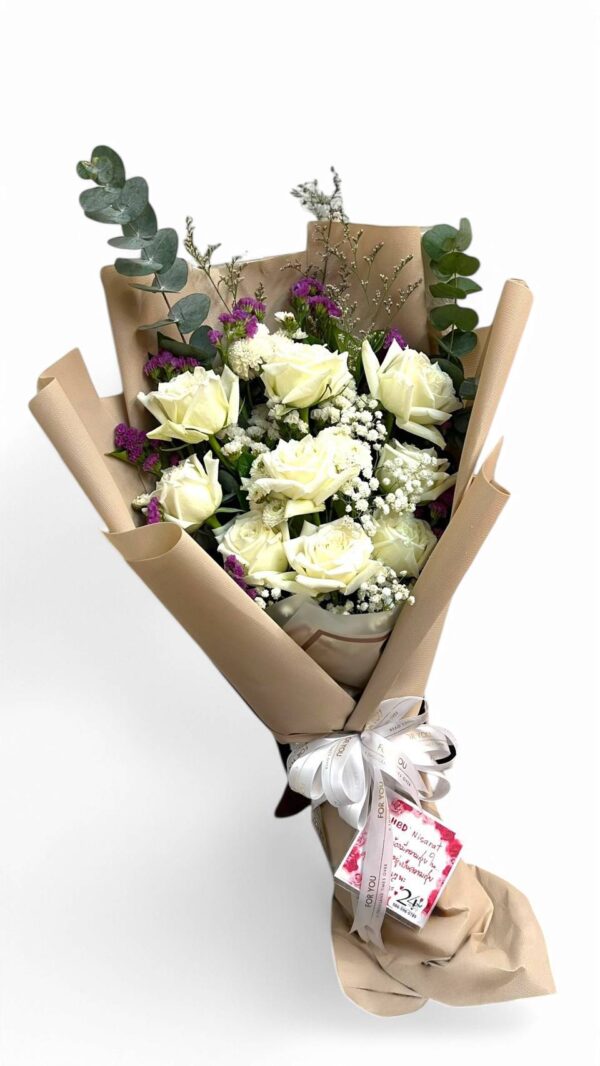 9 long-stemmed white roses decorated with brown paper