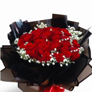 31 red roses wrapped in round black paper