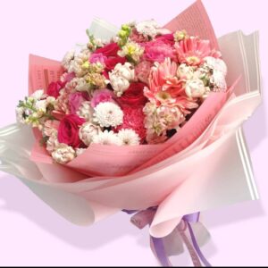 Pink roses decorated with vintage flowers