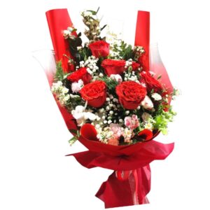 Bouquet of red roses, red paper