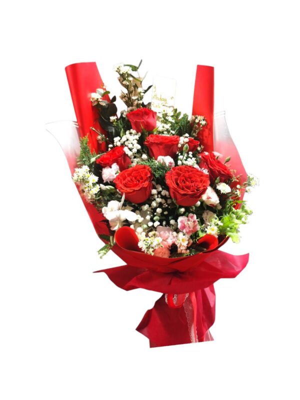 Bouquet of red roses, red paper